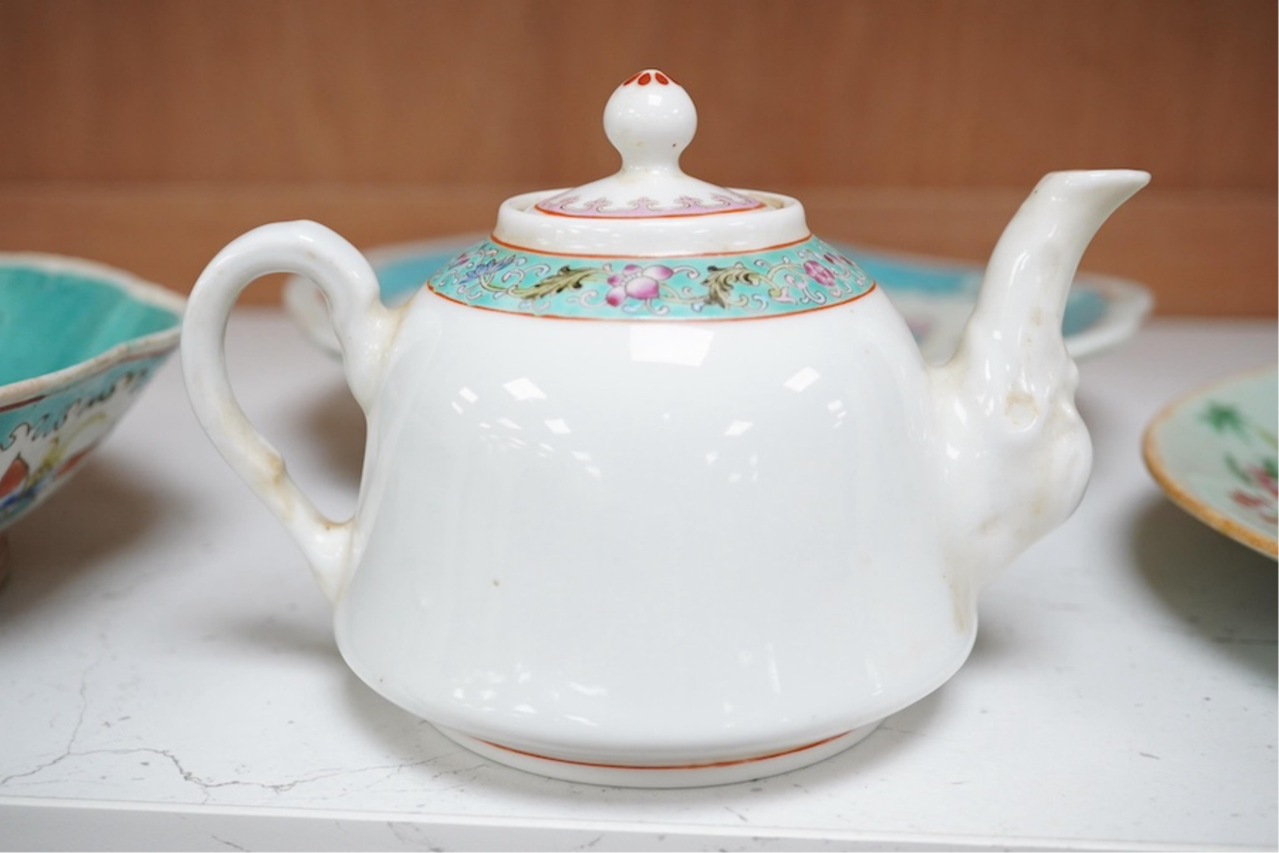 Three Chinese famille rose dishes, late Qing and a famille rose teapot, highest dish 5cm. Condition - fine chip to plate